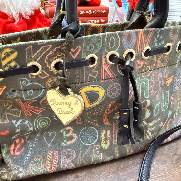Dooney & Bourke Handbags - Vtg Dooney & Bourke Women’s Black Medium Snap closure Monogrammed Shoulder Bag.